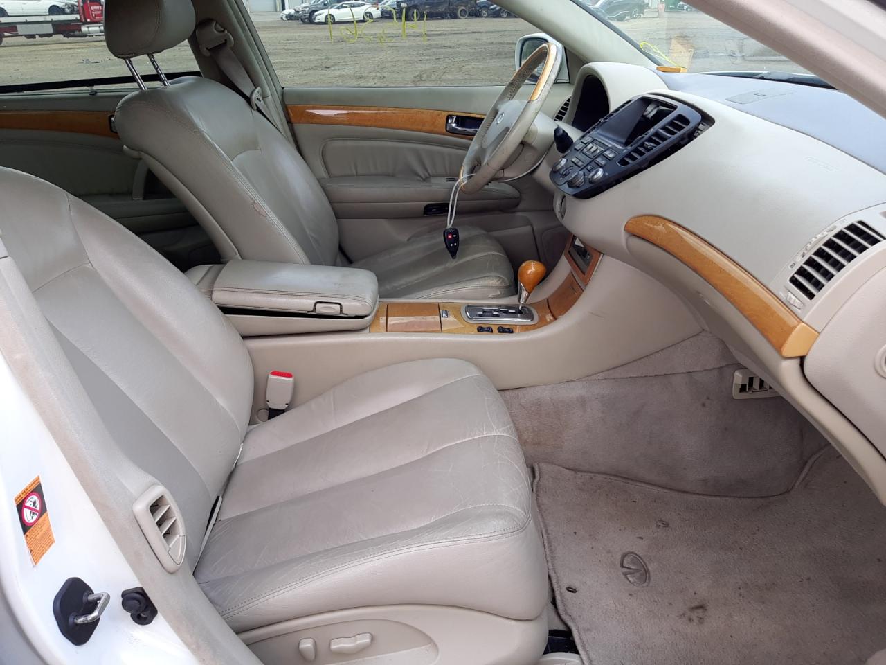 Photo 5 from auction – 2002 INFINITI Q45 with VIN JNKBF01A12M007063