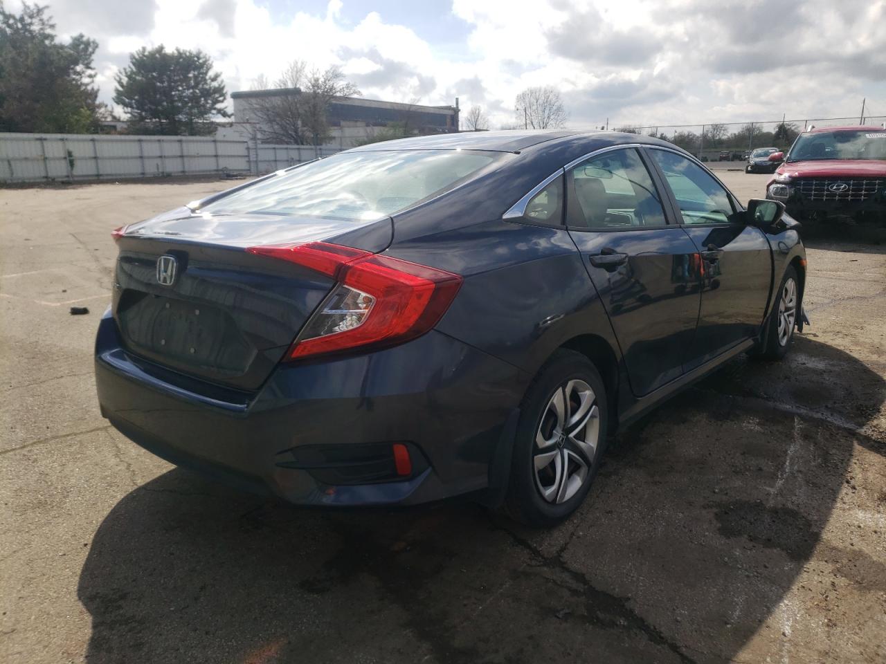 Photo 4 from auction – 2017 HONDA CIVIC LX with VIN 19XFC2F50HE042199