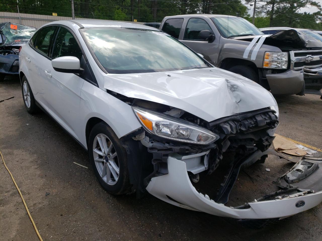 FORD FOCUS SE 2018 with VIN 1FADP3F29JL294950 - Photo from auction