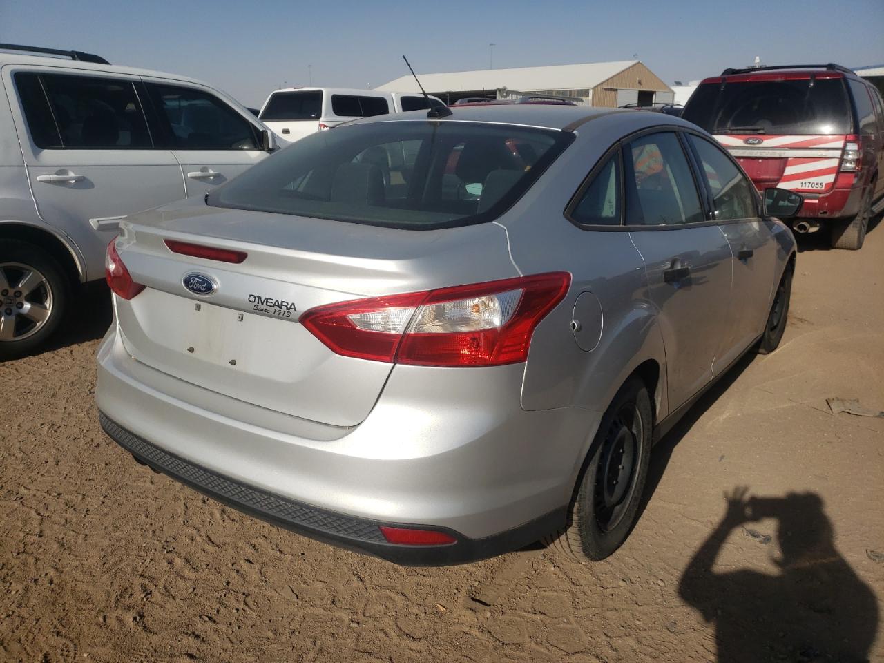 Photo 4 from auction – 2014 FORD FOCUS S with VIN 1FADP3E21EL413372