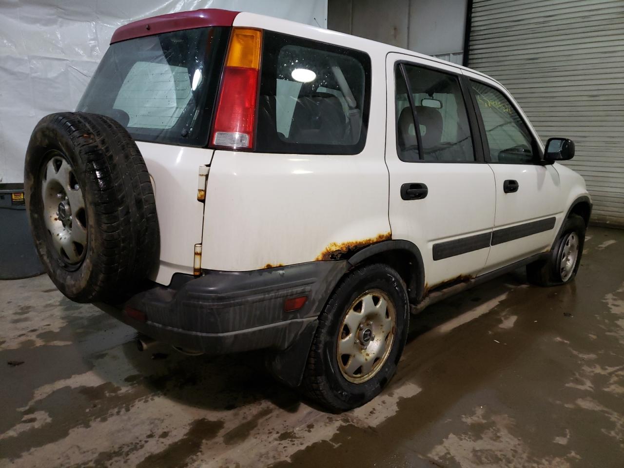 Photo 4 from auction – 2001 HONDA CR-V LX with VIN JHLRD18451S019113