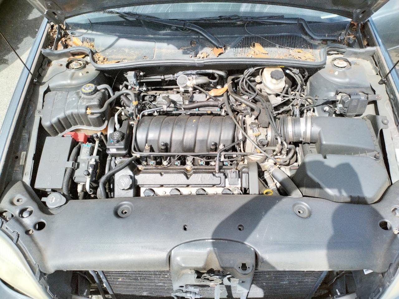 Photo 7 from auction – 2004 CADILLAC DEVILLE with VIN 1G6KD57Y84U115808