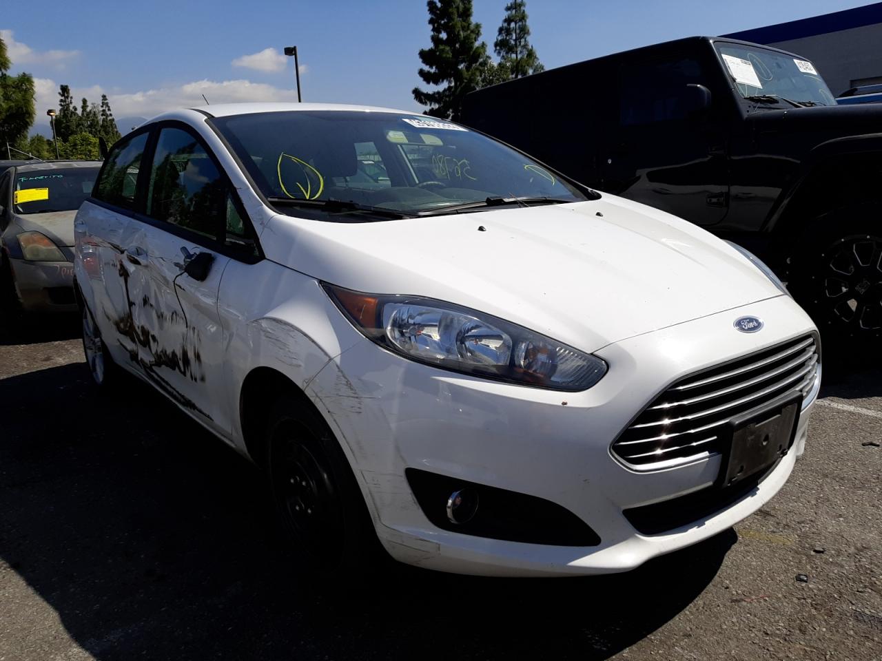 FORD FIESTA SE 2019 with VIN 3FADP4EJ9KM136851 - Photo from auction