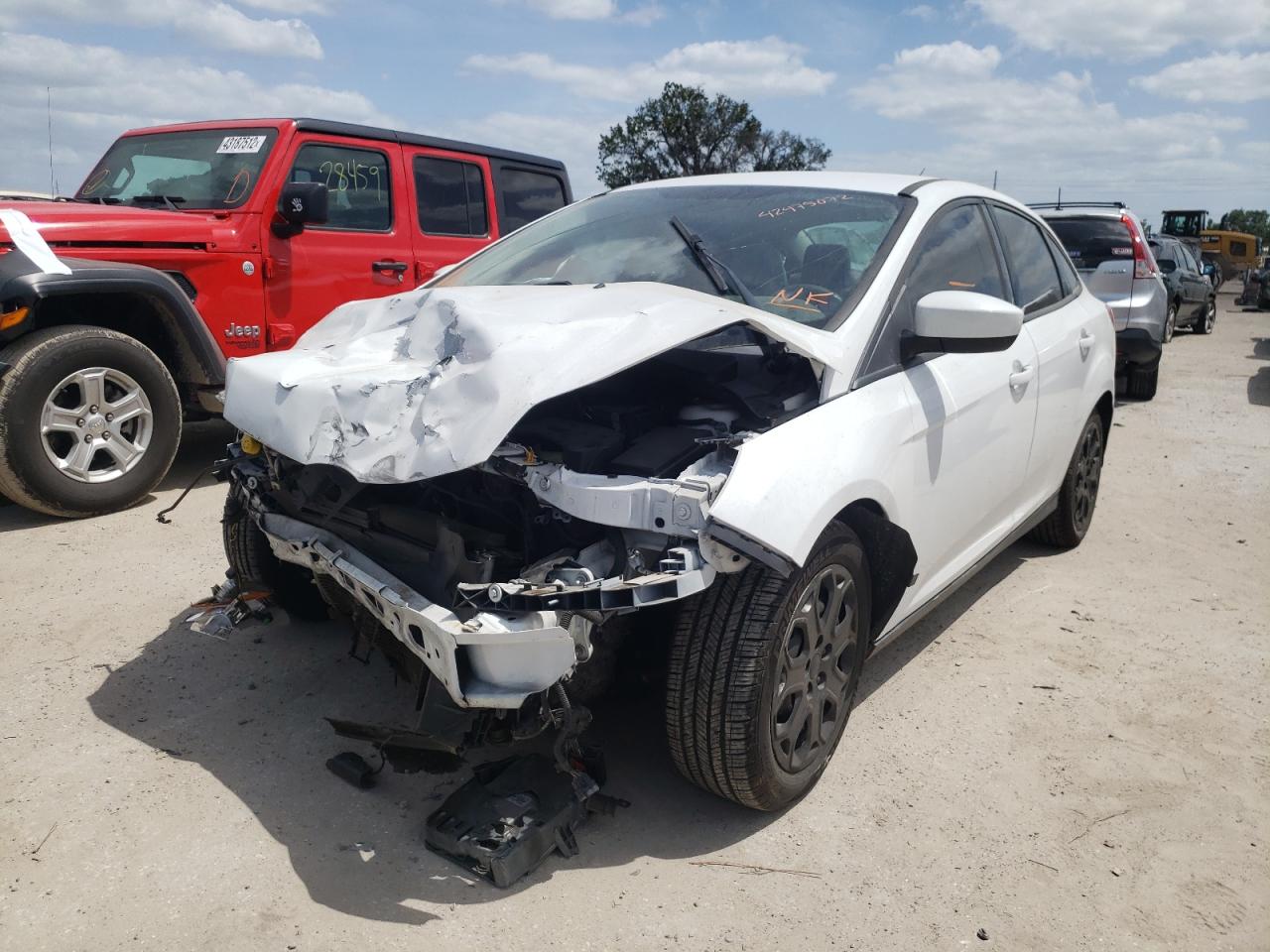 Photo 2 from auction – 2012 FORD FOCUS SE with VIN 1FAHP3F24CL115928