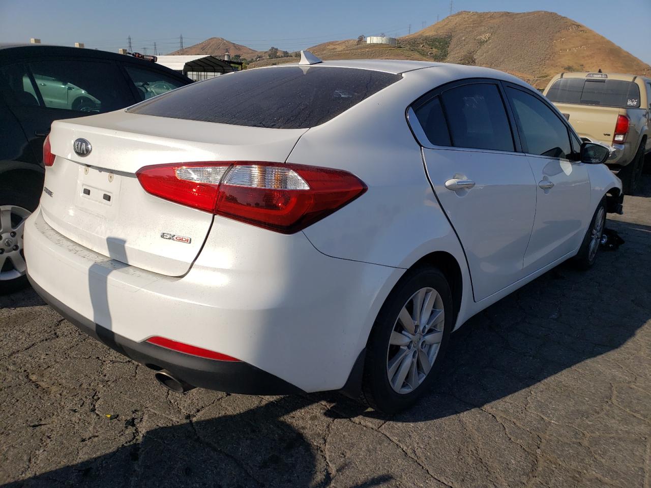 Photo 4 from auction – 2014 KIA FORTE EX with VIN KNAFX4A86E5211079