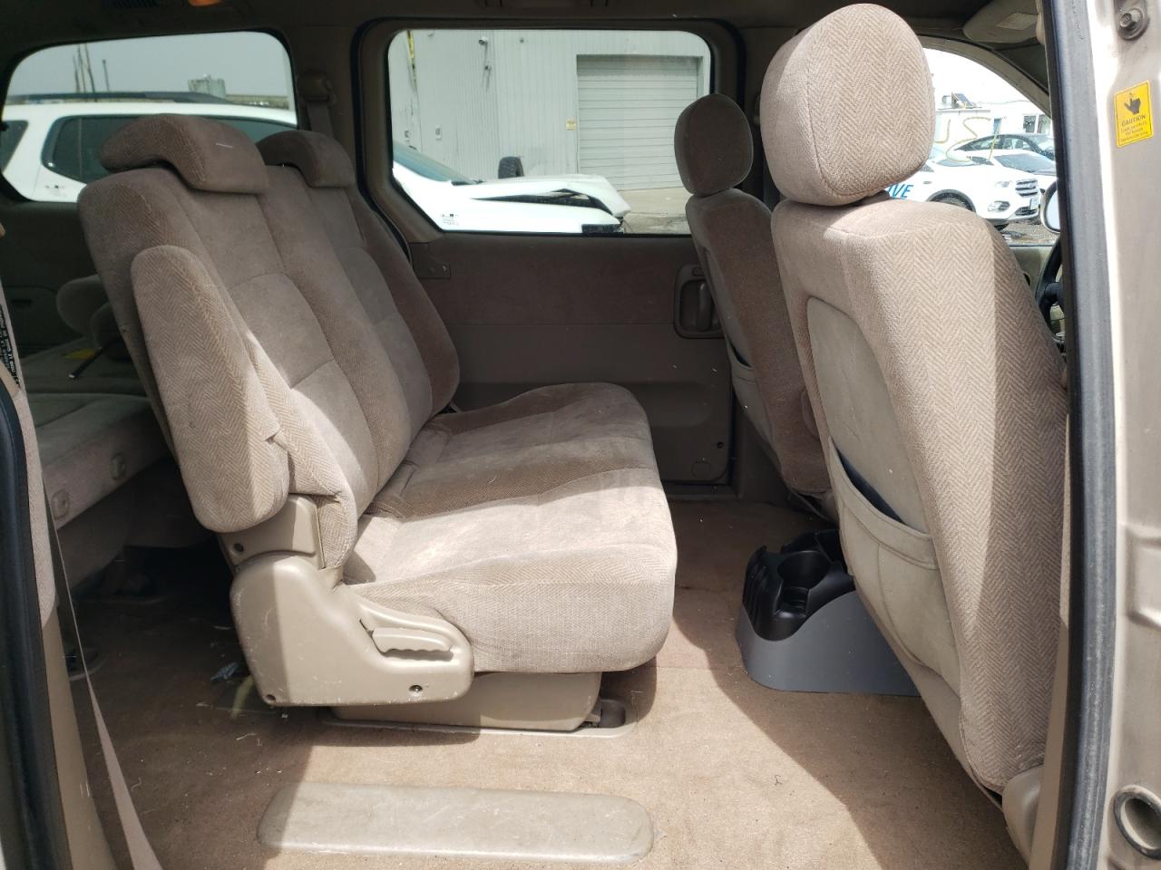 Photo 6 from auction – 2003 KIA SEDONA EX with VIN KNDUP131036406854