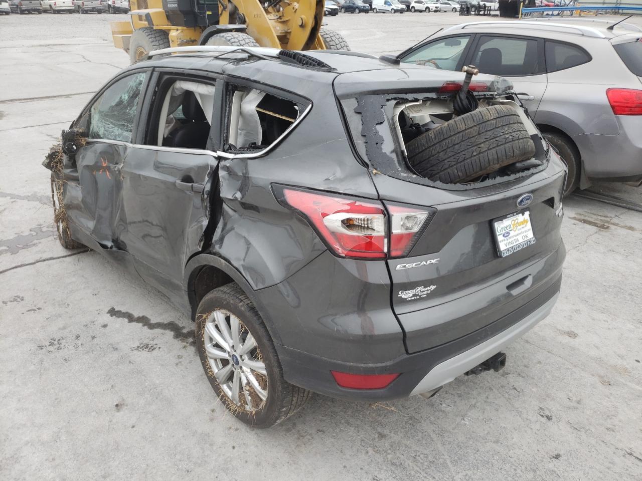 Photo 13 from auction – 2017 FORD ESCAPE TIT with VIN 1FMCU0J97HUC34067