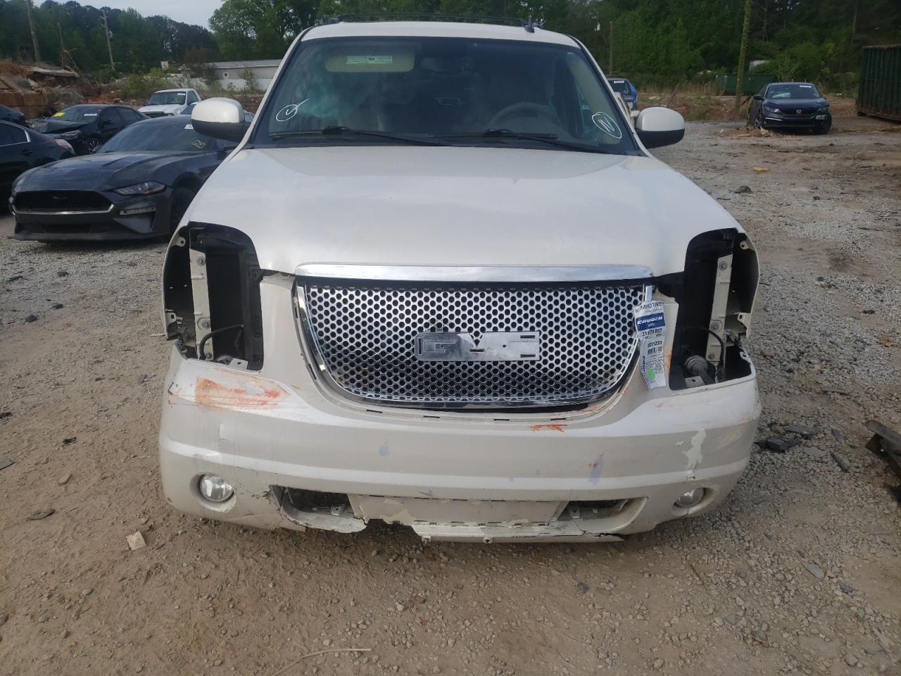 Photo 9 from auction – 2011 GMC YUKON SLT with VIN 1GKS1CE00BR385563