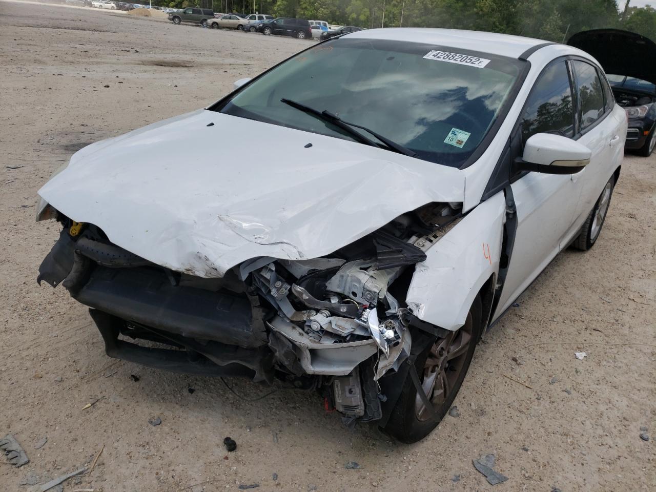 Photo 2 from auction – 2014 FORD FOCUS SE with VIN 1FADP3F29EL417250