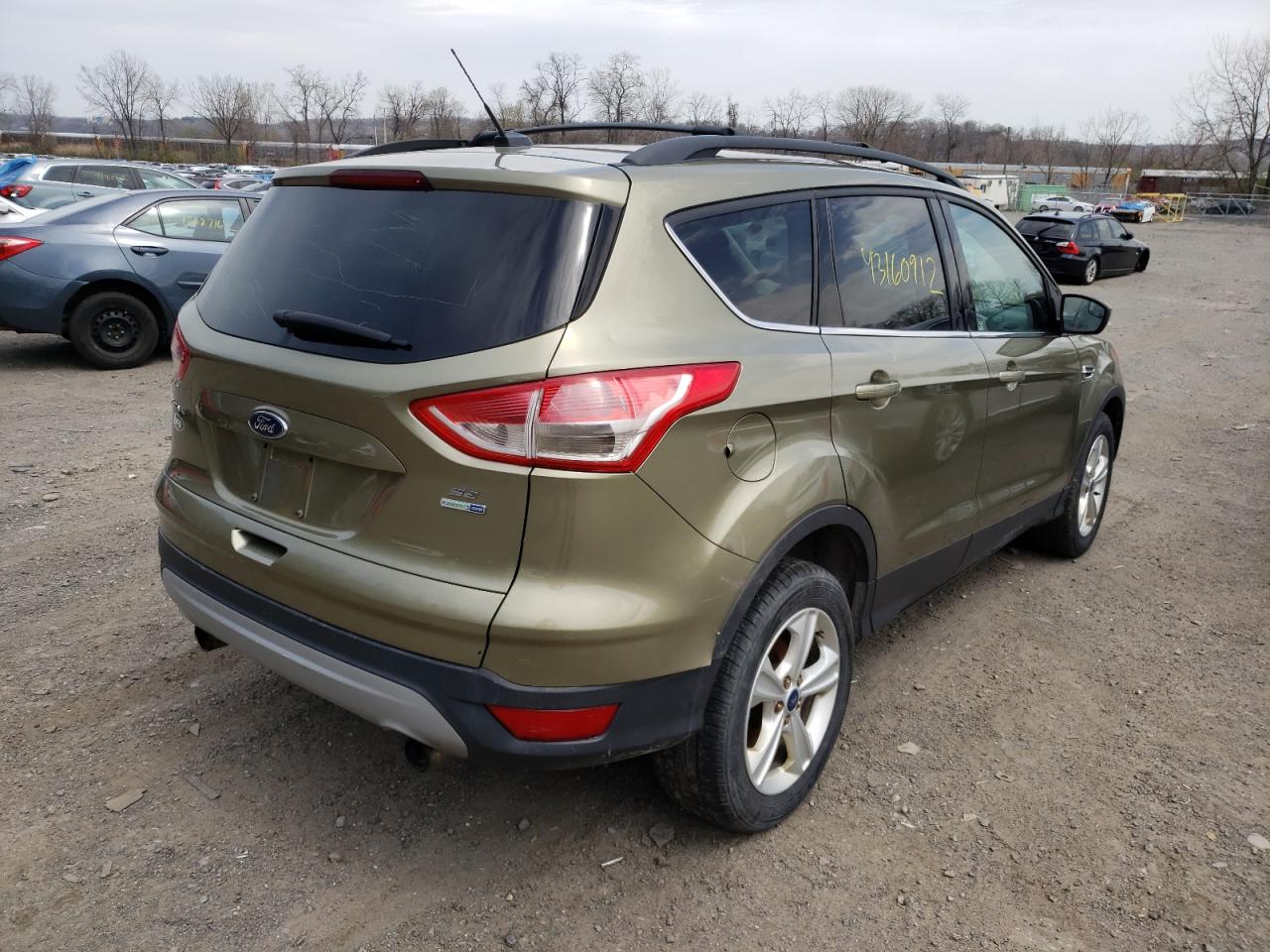Photo 4 from auction – 2013 FORD ESCAPE SE with VIN 1FMCU9G94DUB35308