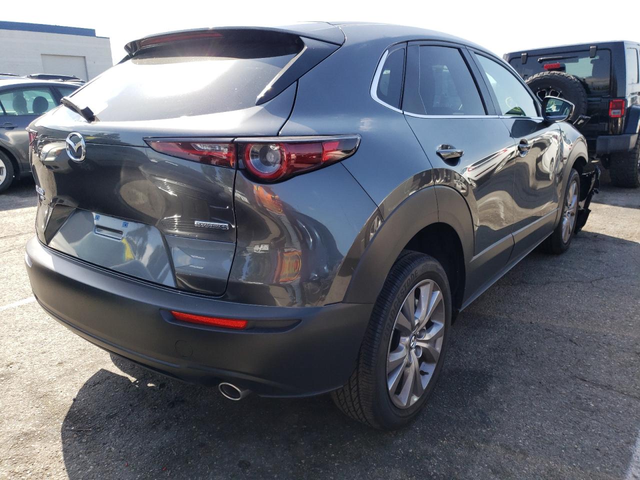 Photo 4 from auction – 2021 MAZDA CX-30 SELE with VIN 3MVDMBBL0MM317898