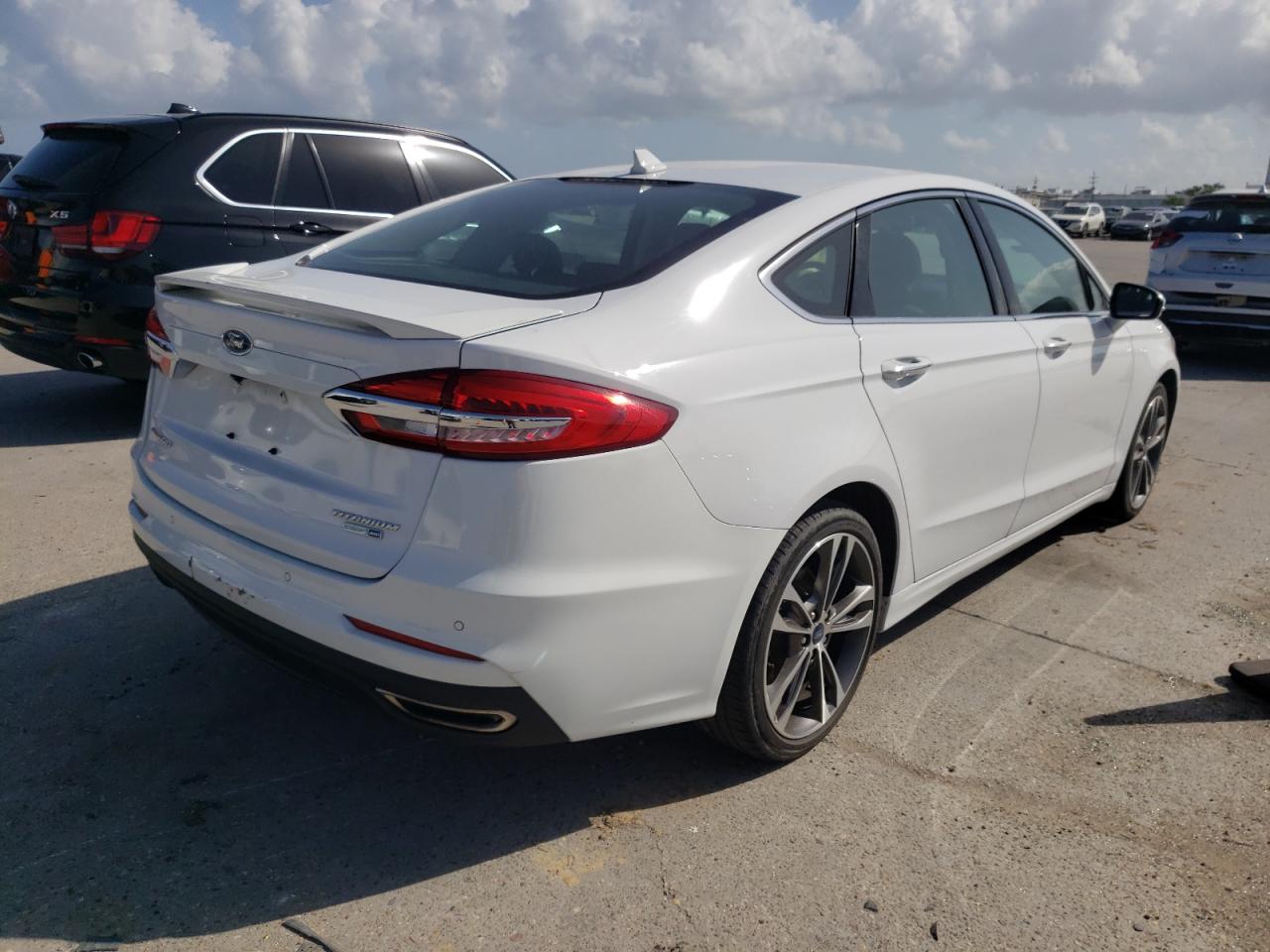 Photo 4 from auction – 2019 FORD FUSION TIT with VIN 3FA6P0D93KR210485