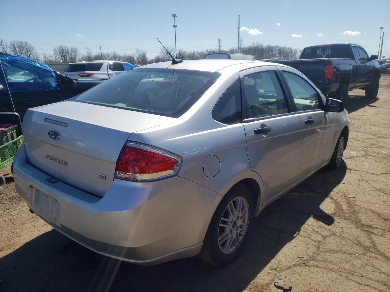 Photo 4 from auction – 2011 FORD FOCUS SE with VIN 1FAHP3FN1BW119698