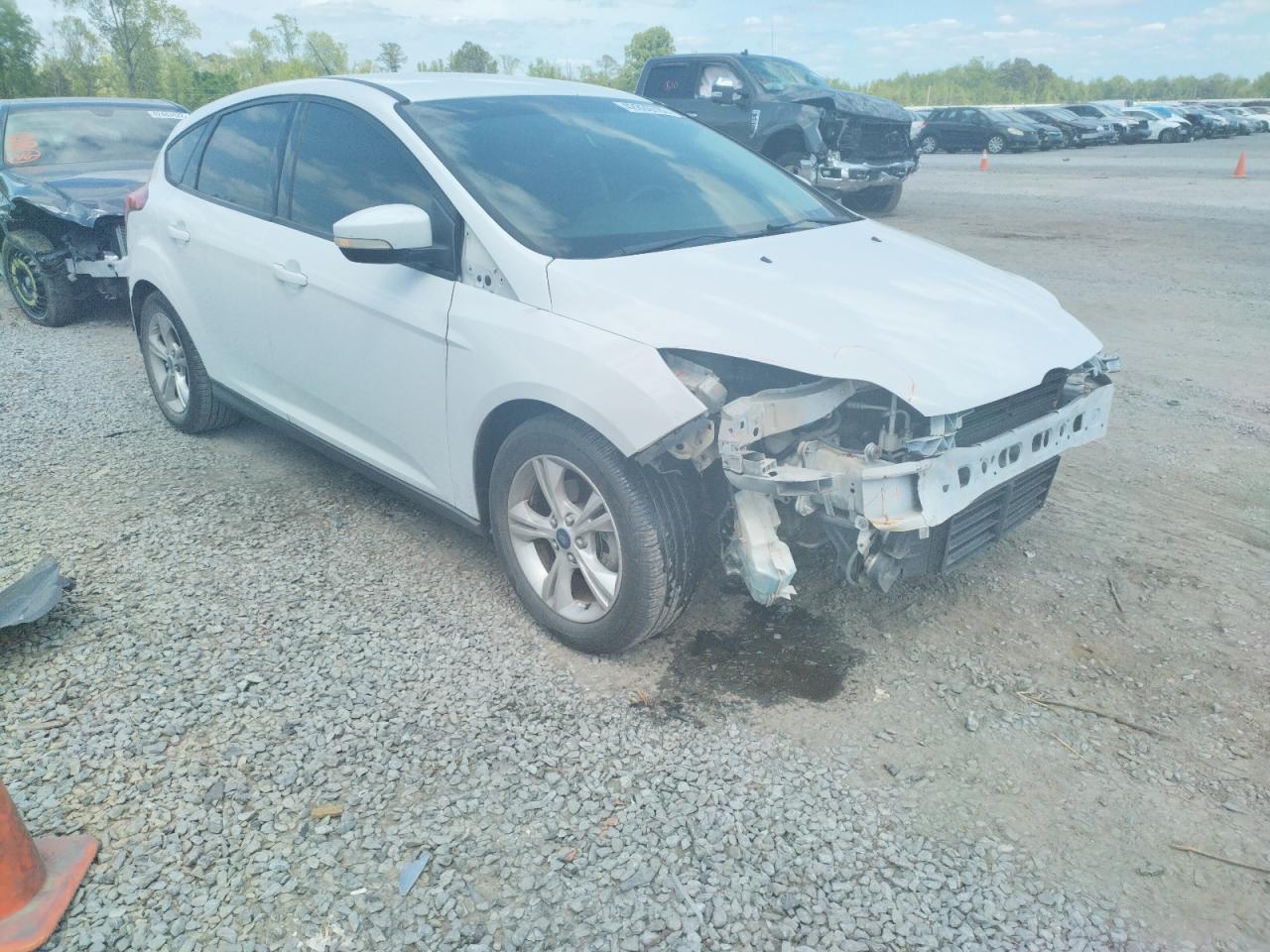 Photo 9 from auction – 2013 FORD FOCUS with VIN 1FADP3K23DL254177