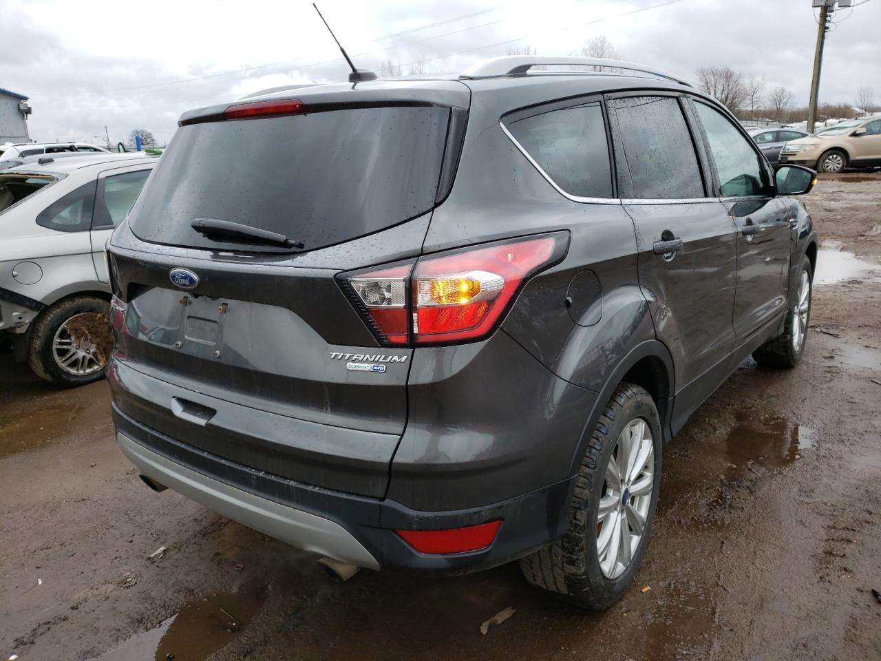 Photo 4 from auction – 2017 FORD ESCAPE TIT with VIN 1FMCU9JD0HUB88087