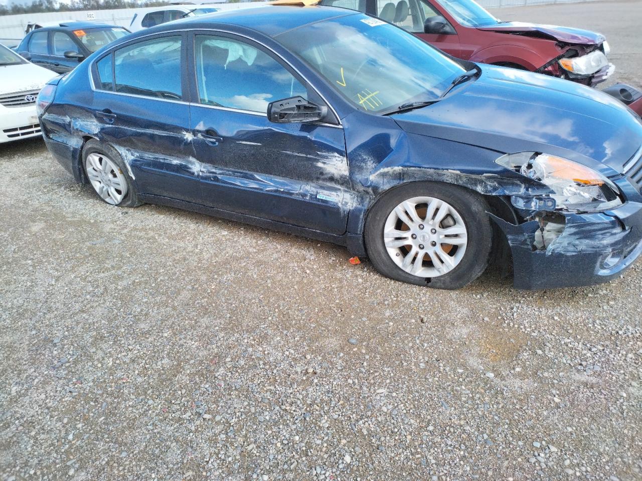 Photo 9 from auction – 2010 NISSAN ALTIMA HYB with VIN 1N4CL2AP7AC186444