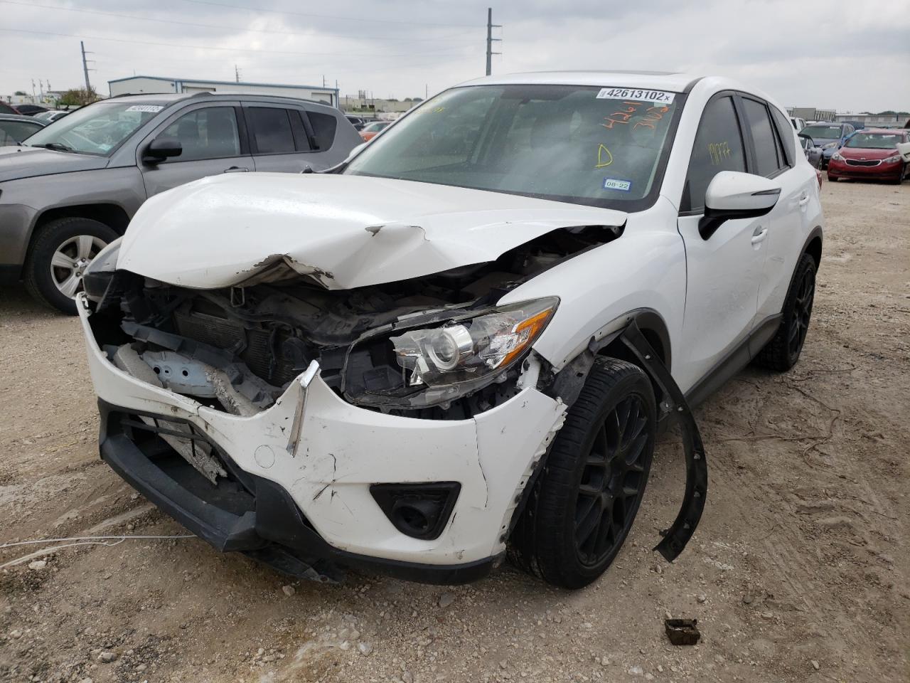 Photo 2 from auction – 2015 MAZDA CX-5 TOURI with VIN JM3KE2CY4F0482673