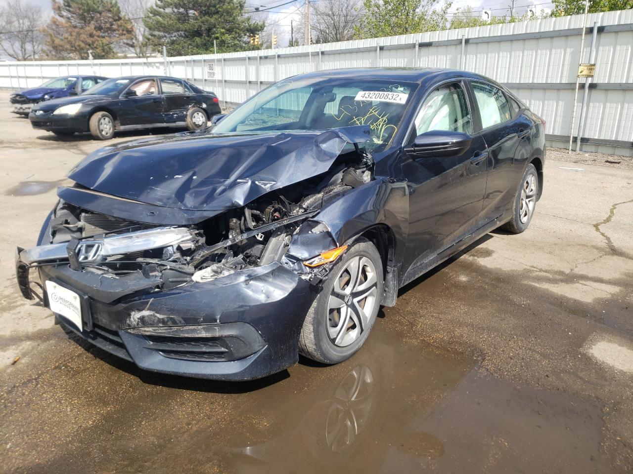 Photo 2 from auction – 2017 HONDA CIVIC LX with VIN 19XFC2F50HE042199