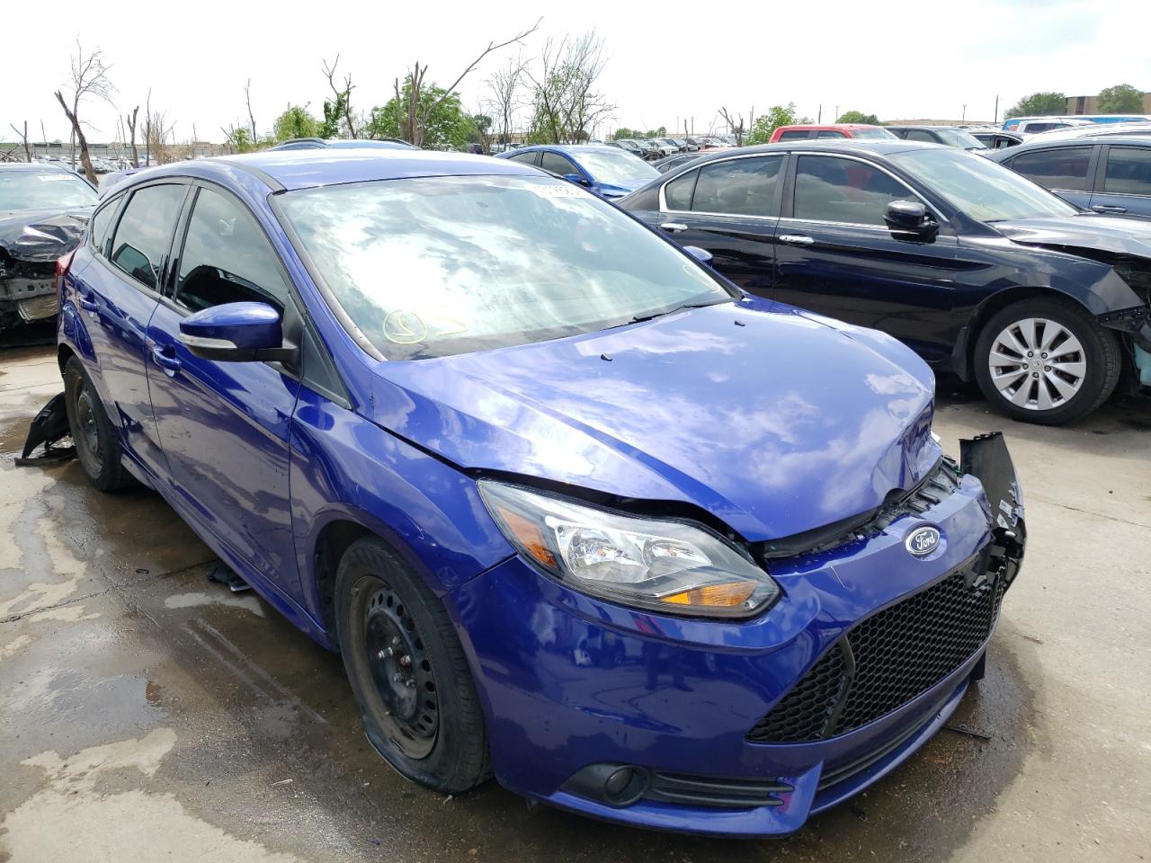 FORD FOCUS ST 2014 with VIN 1FADP3L98EL276043 - Photo from auction