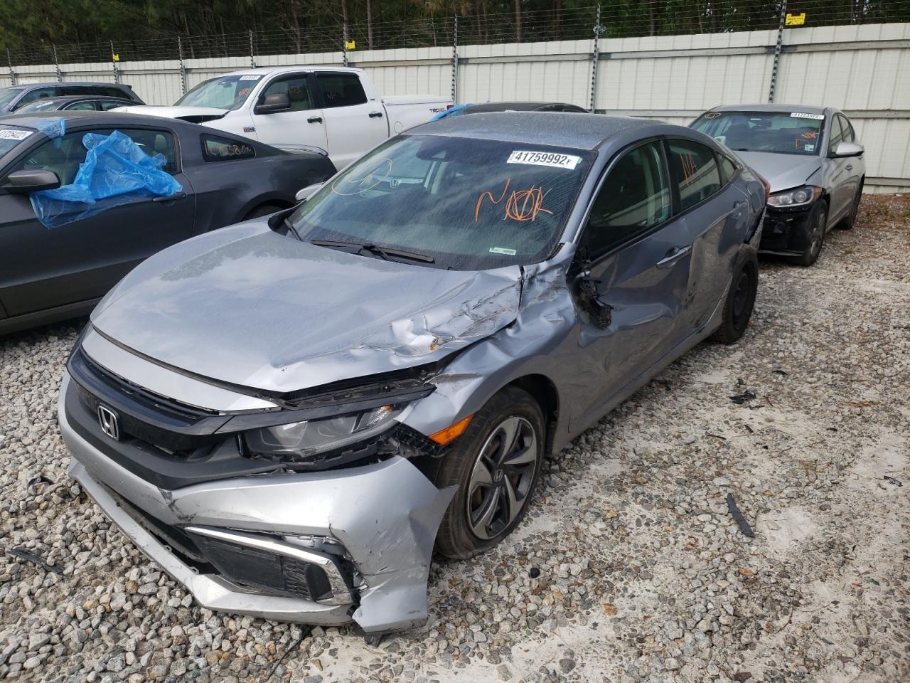 Photo 2 from auction – 2019 HONDA CIVIC with VIN 19XFC2F6XKE021277