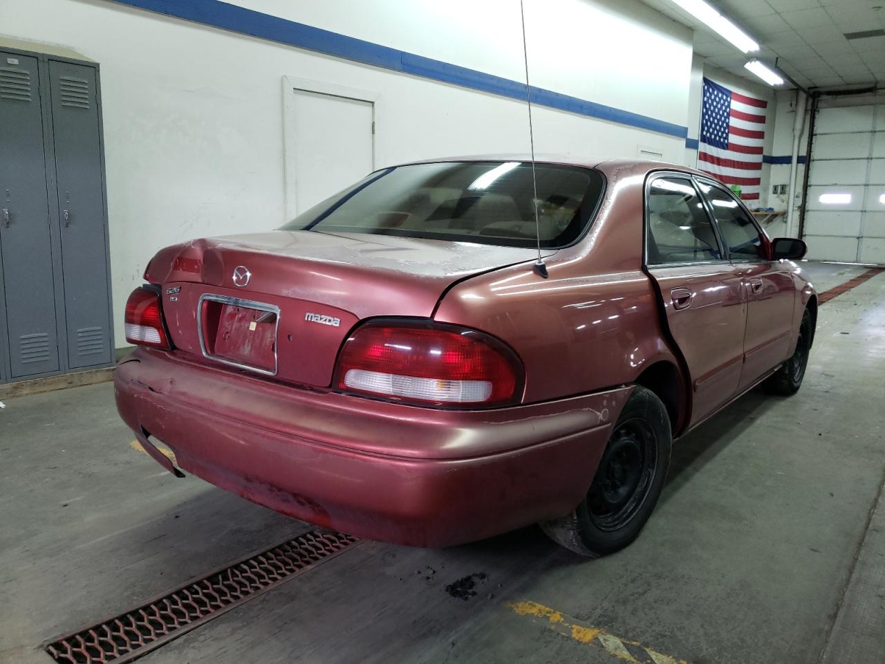 Photo 4 from auction – 1998 MAZDA 626 DX with VIN 1YVGF22C0W5716256