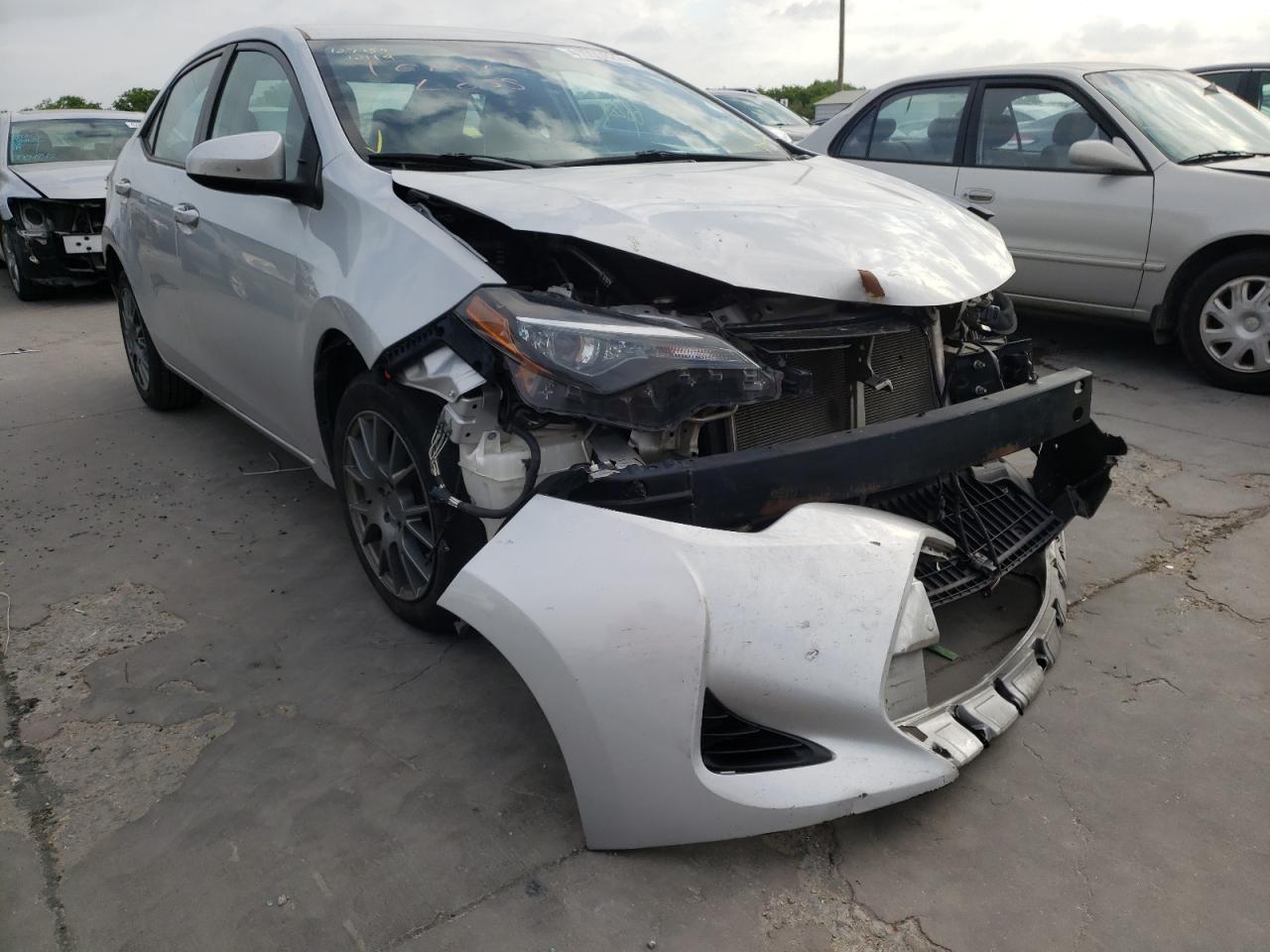 TOYOTA COROLLA L 2018 with VIN 5YFBURHE2JP802946 - Photo from auction