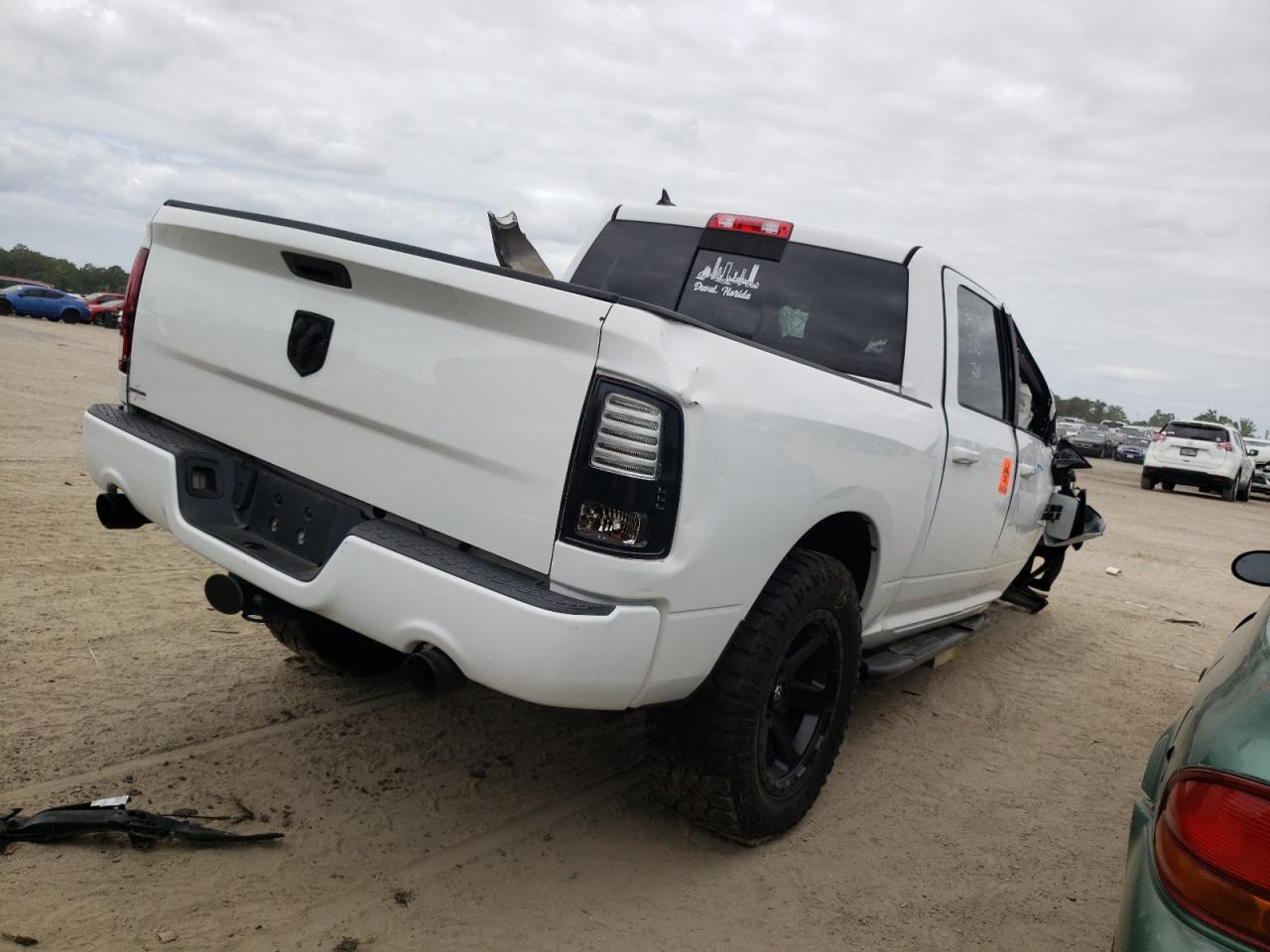 Photo 4 from auction – 2015 RAM 1500 LARAM with VIN 1C6RR6MT3FS514675