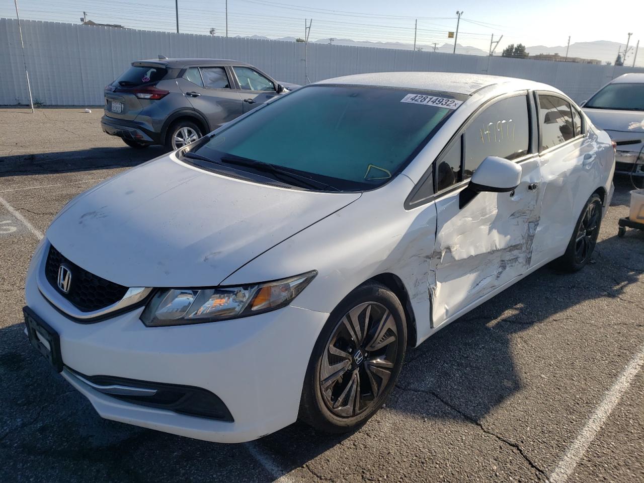 Photo 2 from auction – 2013 HONDA CIVIC LX with VIN 19XFB2F50DE257112
