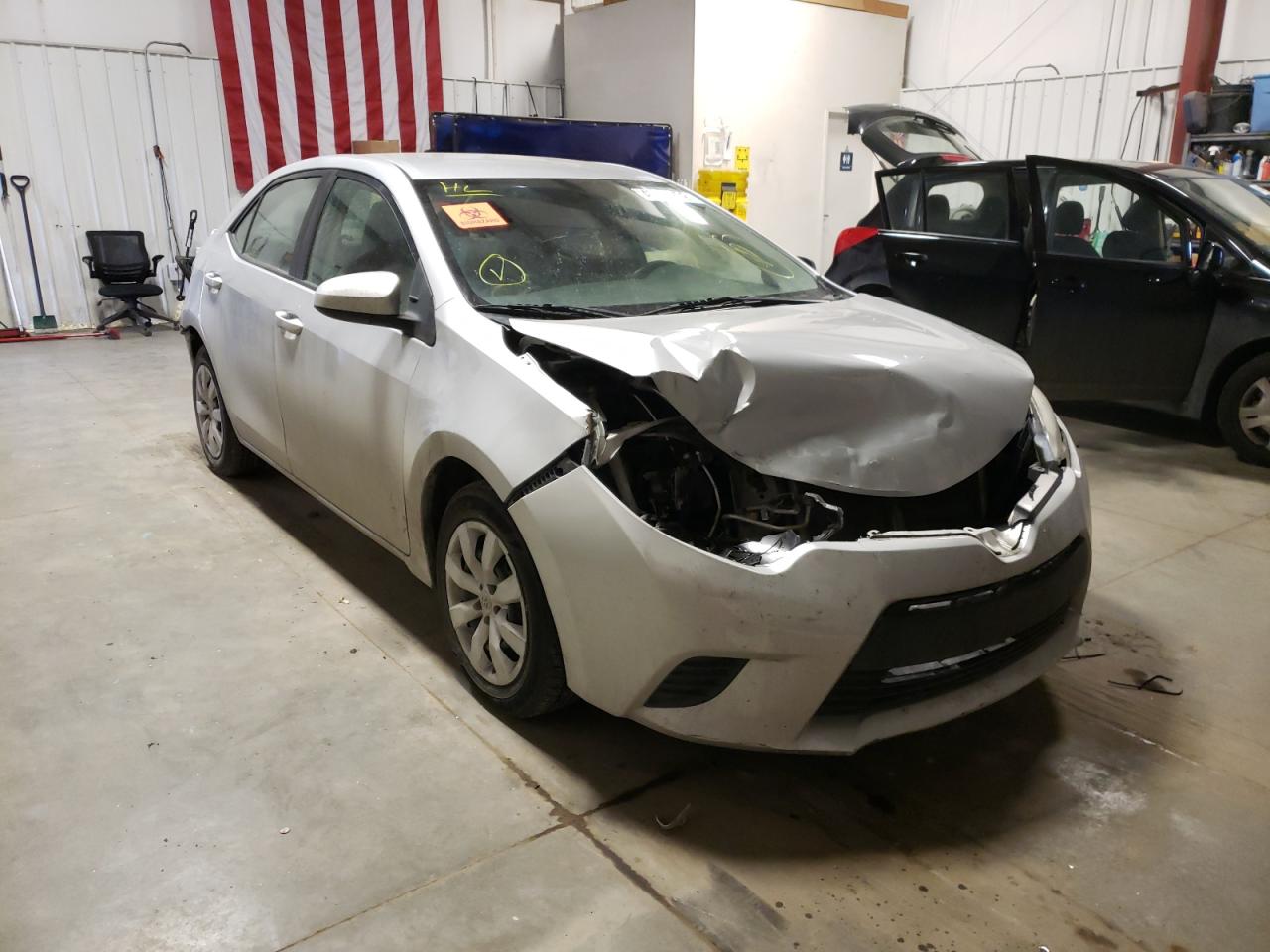TOYOTA COROLLA L 2014 with VIN 5YFBURHE0EP145330 - Photo from auction