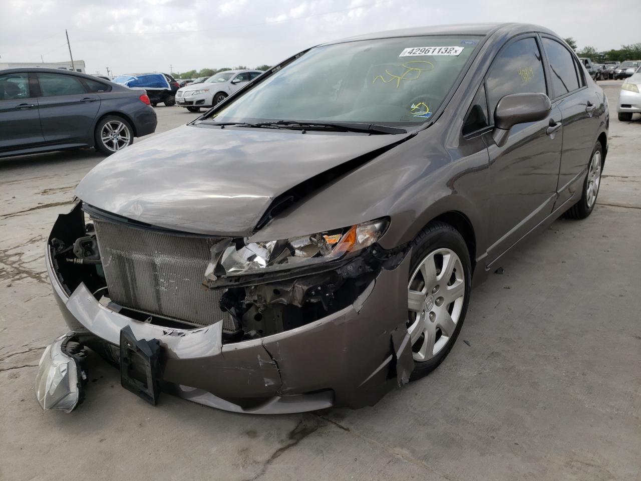 Photo 2 from auction – 2009 HONDA CIVIC LX with VIN 19XFA16589E003216