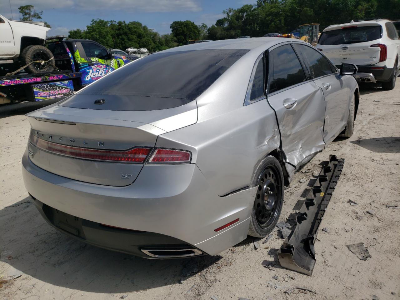 Photo 4 from auction – 2014 LINCOLN MKZ with VIN 3LN6L2GK6ER802737