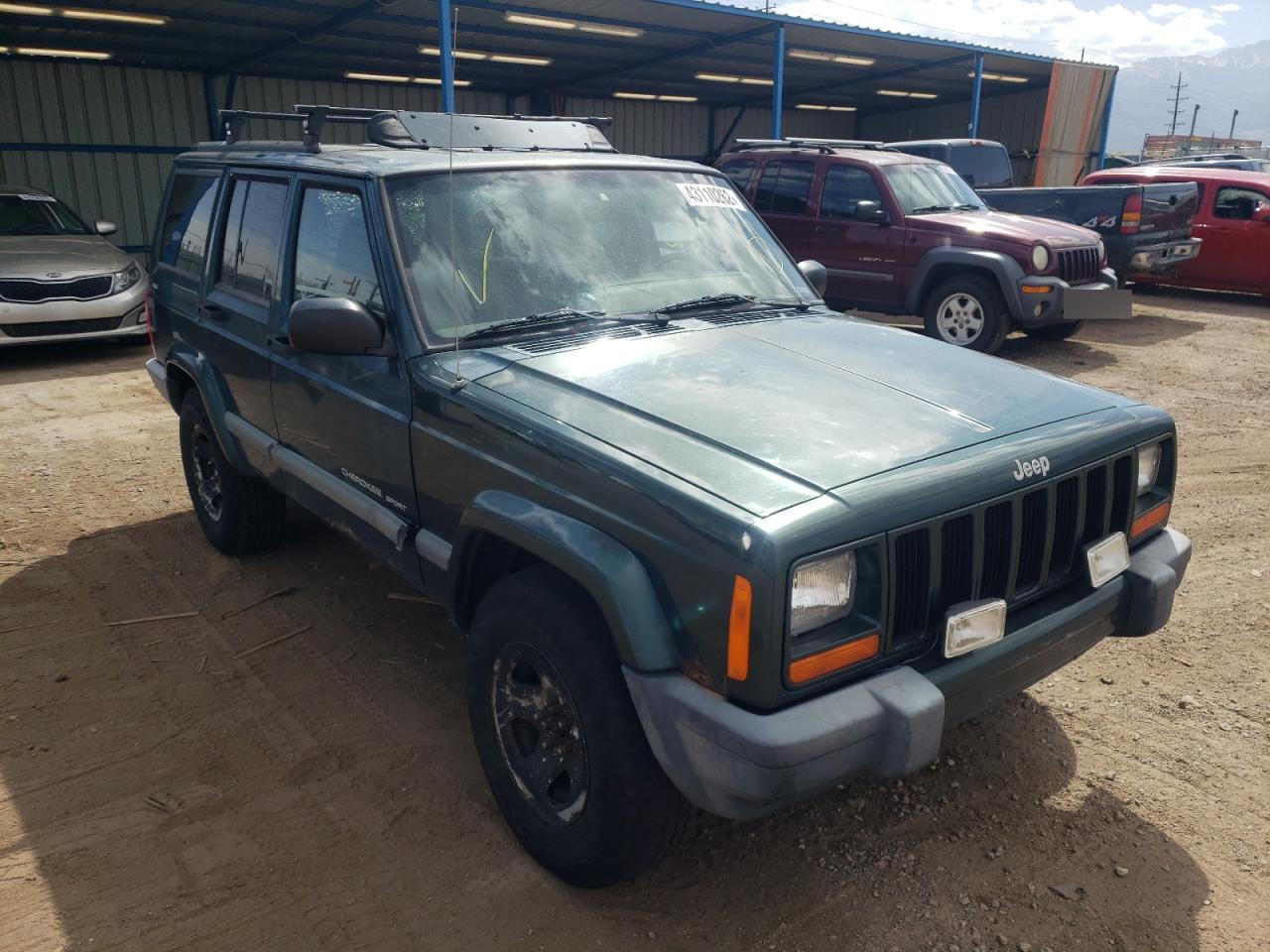 JEEP CHEROKEE S 1999 with VIN 1J4FF68S9XL673003 - Photo from auction