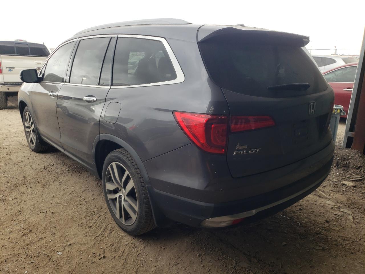 Photo 3 from auction – 2017 HONDA PILOT TOUR with VIN 5FNYF5H91HB005545