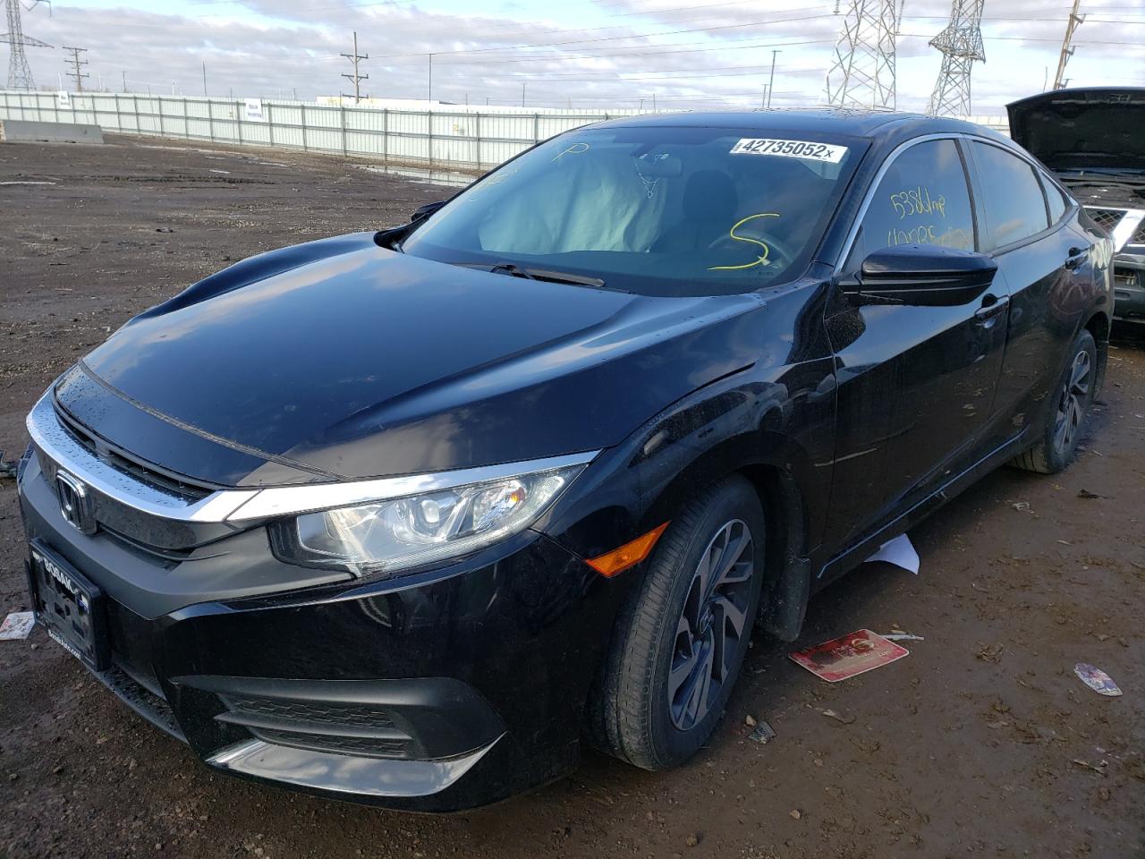 Photo 2 from auction – 2018 HONDA CIVIC EX with VIN 19XFC2F76JE032509