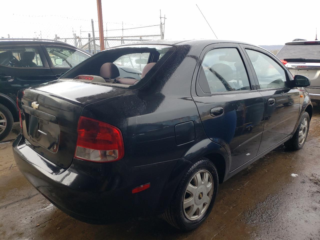 Photo 4 from auction – 2004 CHEVROLET AVEO LS with VIN KL1TJ52614B212769