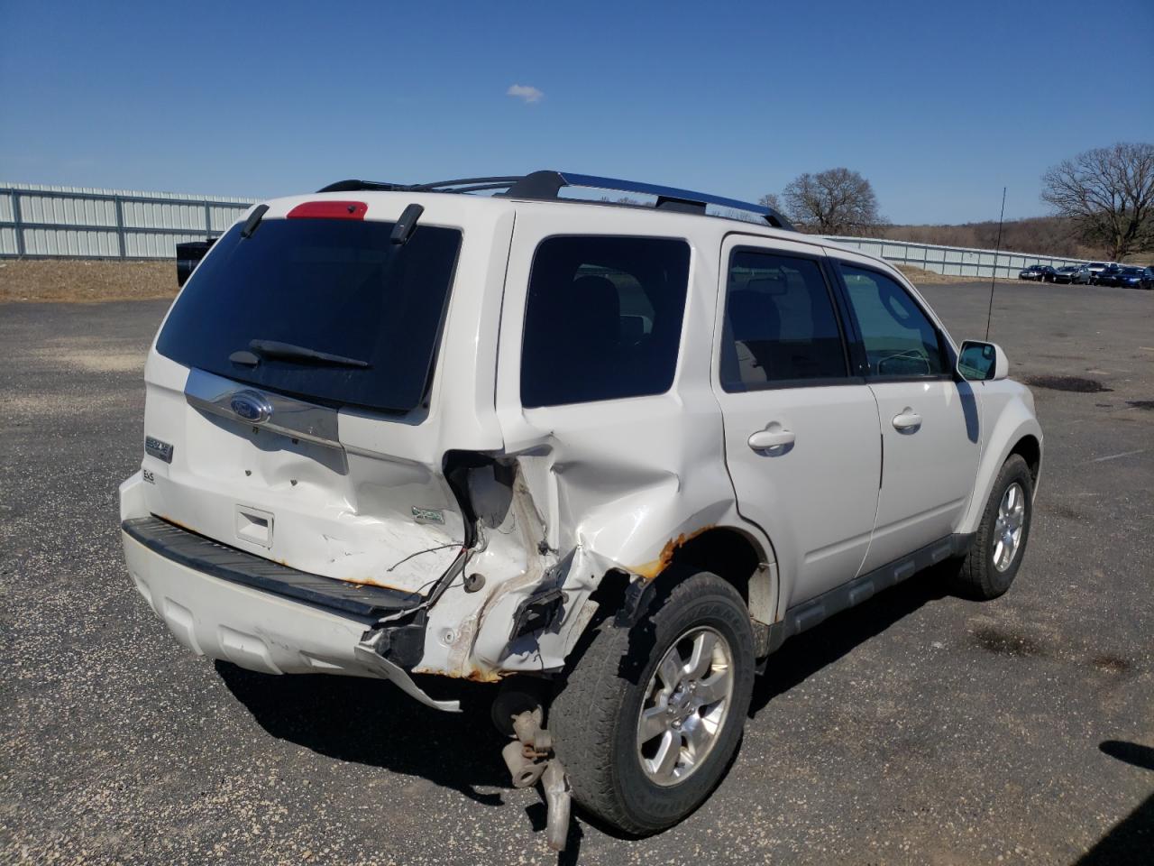 Photo 4 from auction – 2011 FORD ESCAPE LIM with VIN 1FMCU9EG9BKB29577