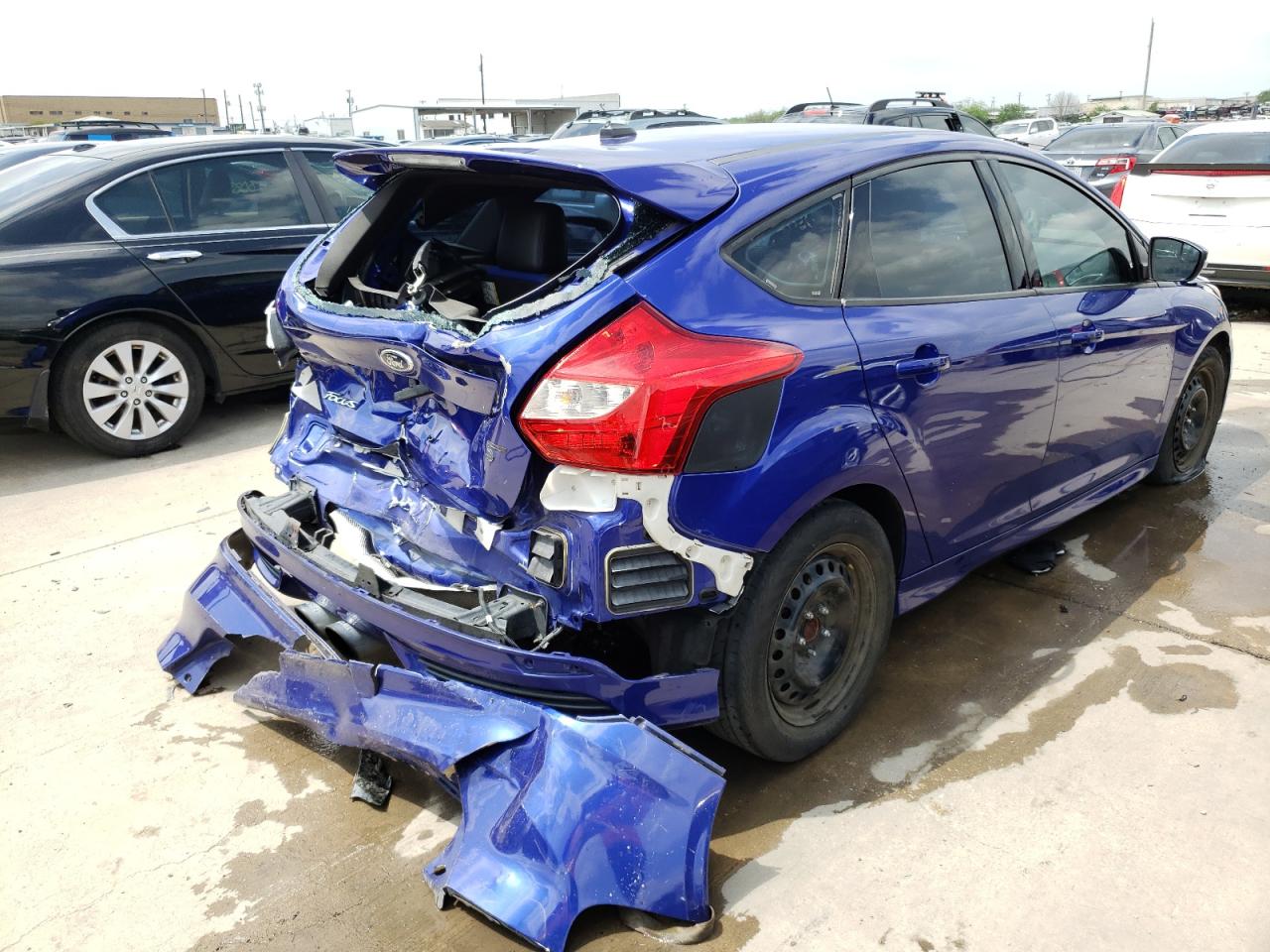 Photo 4 from auction – 2014 FORD FOCUS ST with VIN 1FADP3L98EL276043