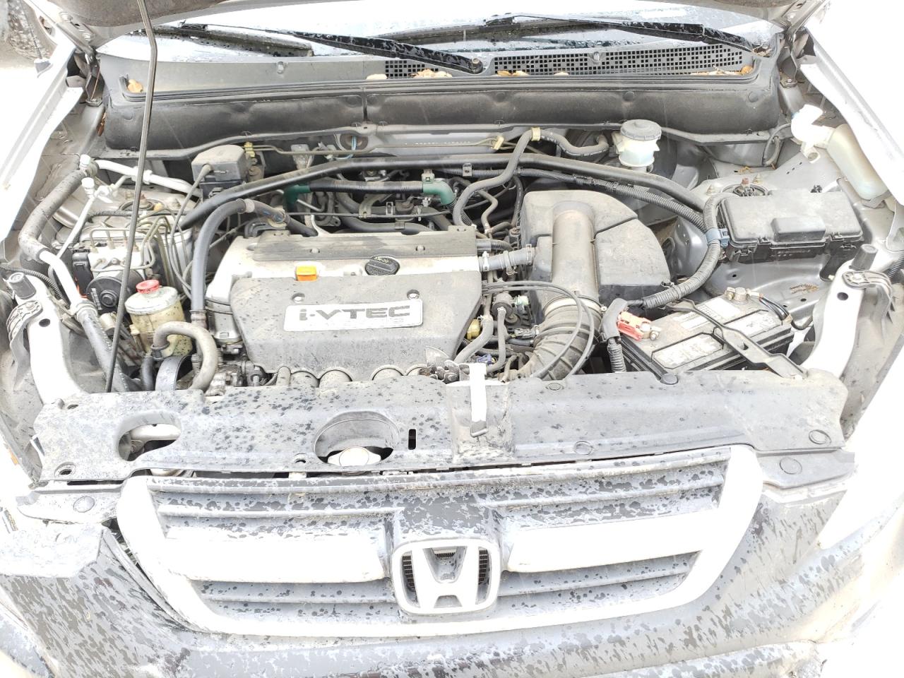 Photo 7 from auction – 2004 HONDA CR-V EX with VIN JHLRD78814C053327