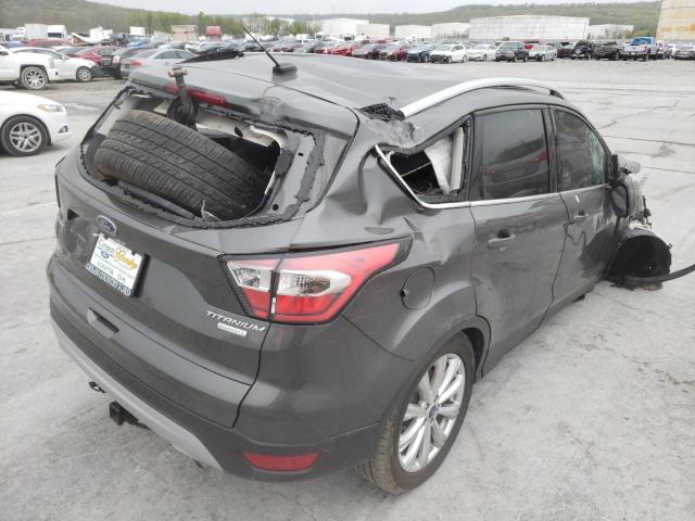 Photo 4 from auction – 2017 FORD ESCAPE TIT with VIN 1FMCU0J97HUC34067
