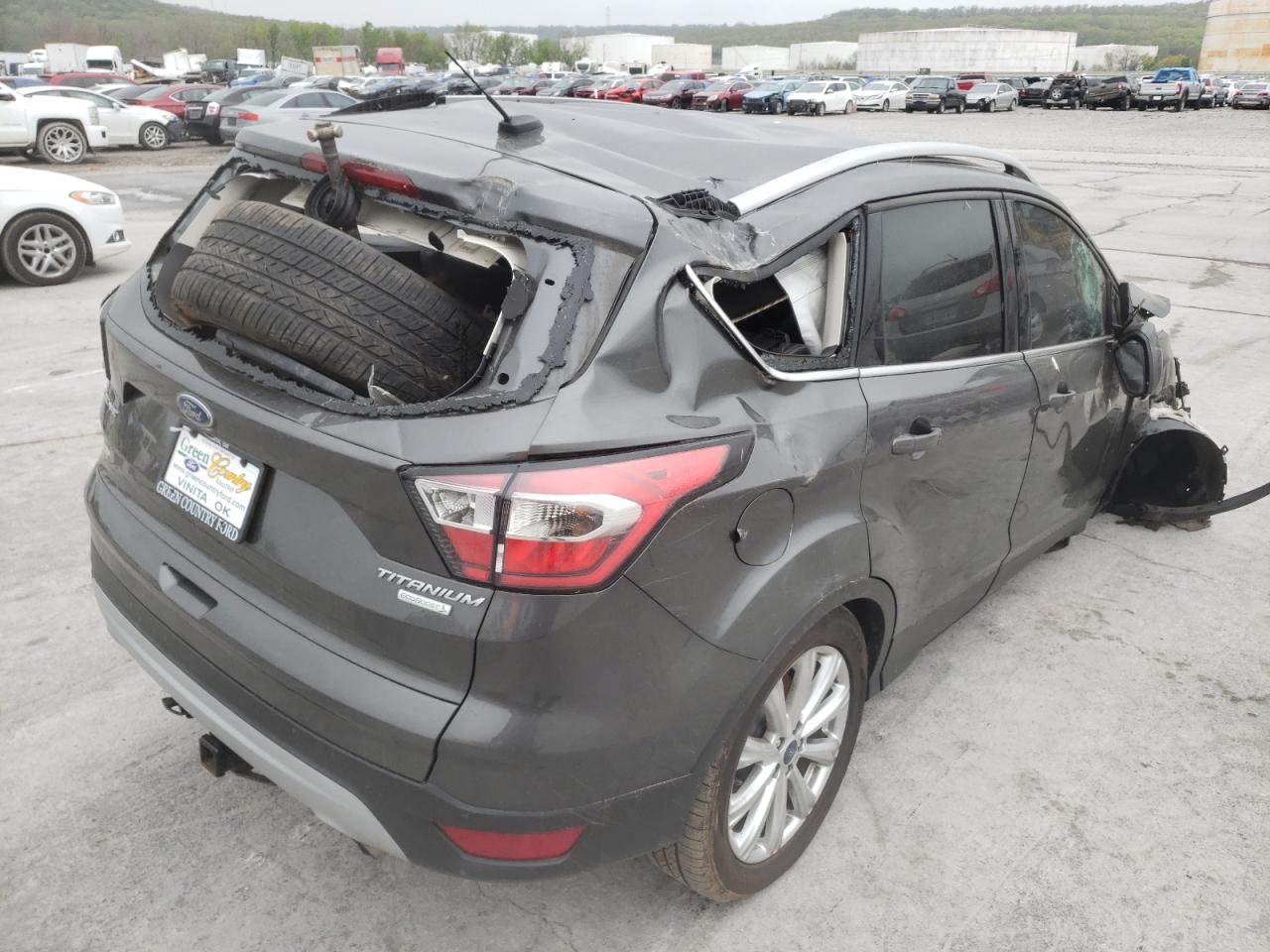 Photo 14 from auction – 2017 FORD ESCAPE TIT with VIN 1FMCU0J97HUC34067