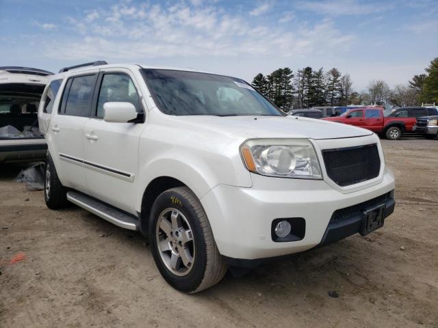 HONDA PILOT TOUR 2011 with VIN 5FNYF4H90BB056181 - Photo from auction