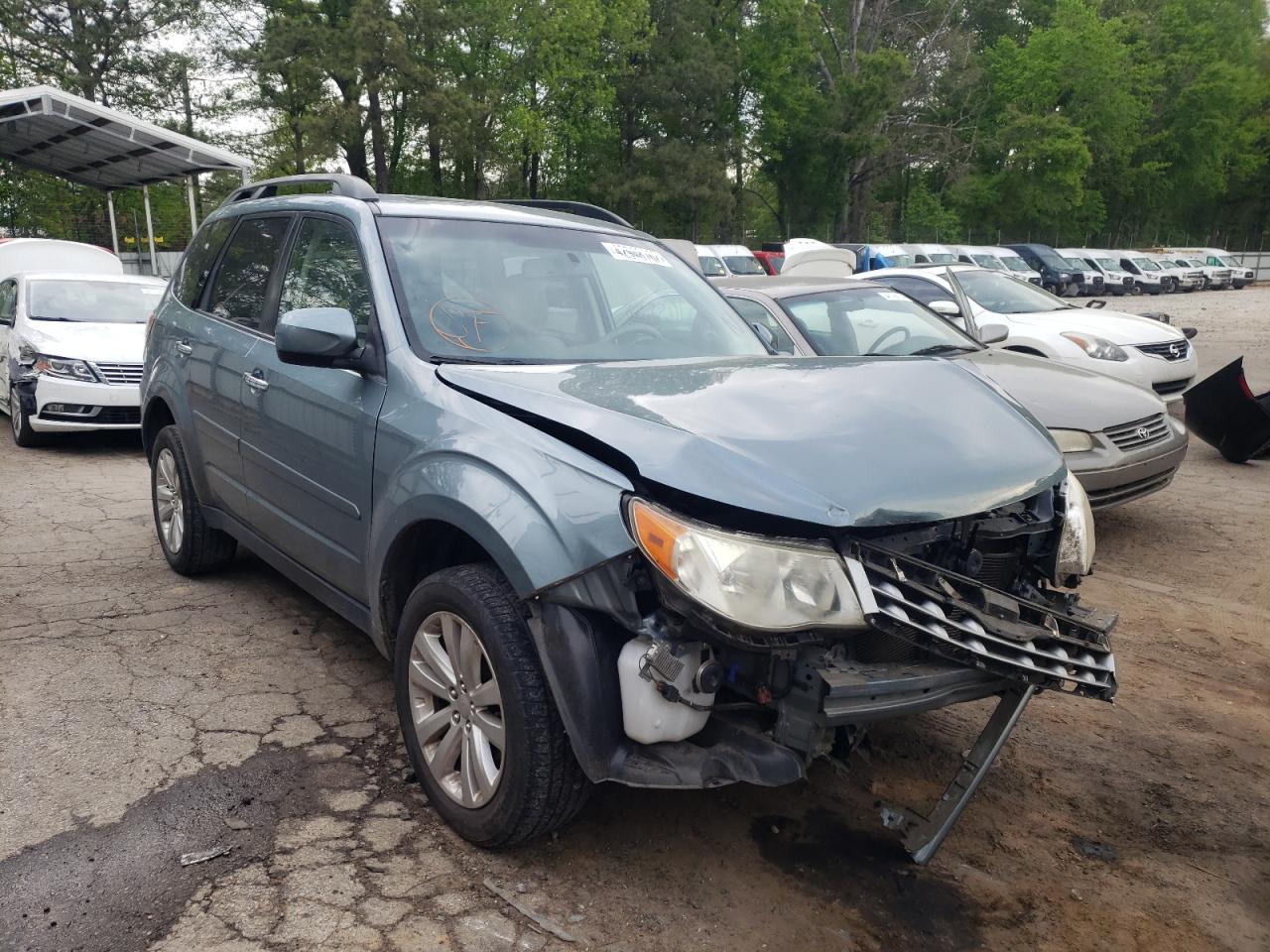 SUBARU FORESTER 2 2011 with VIN JF2SHBDC4BH737418 - Photo from auction