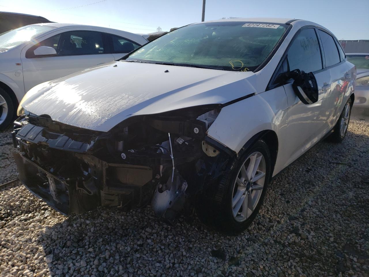 Photo 2 from auction – 2016 FORD FOCUS SE with VIN 1FADP3F26GL214092