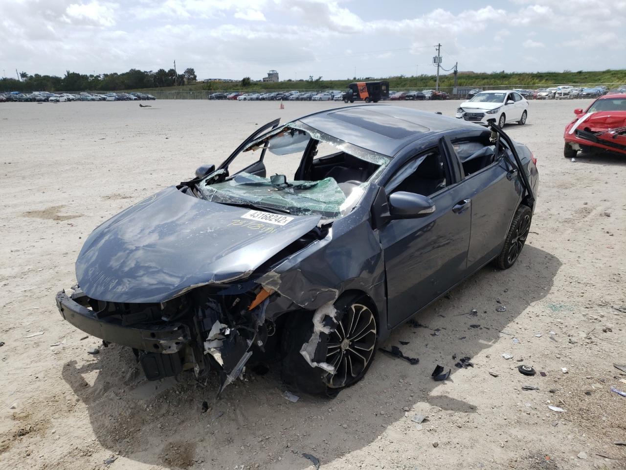 Photo 12 from auction – 2016 TOYOTA COROLLA L with VIN 5YFBURHE9GP564117