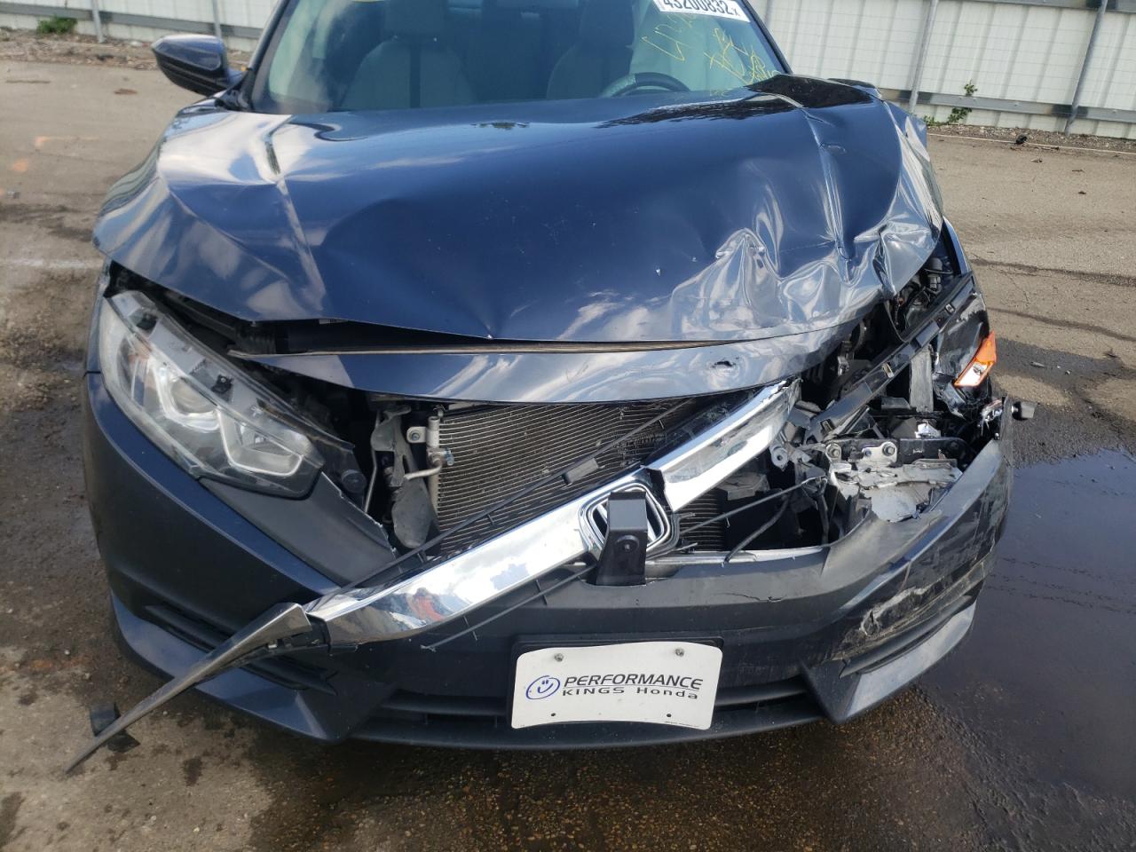 Photo 9 from auction – 2017 HONDA CIVIC LX with VIN 19XFC2F50HE042199