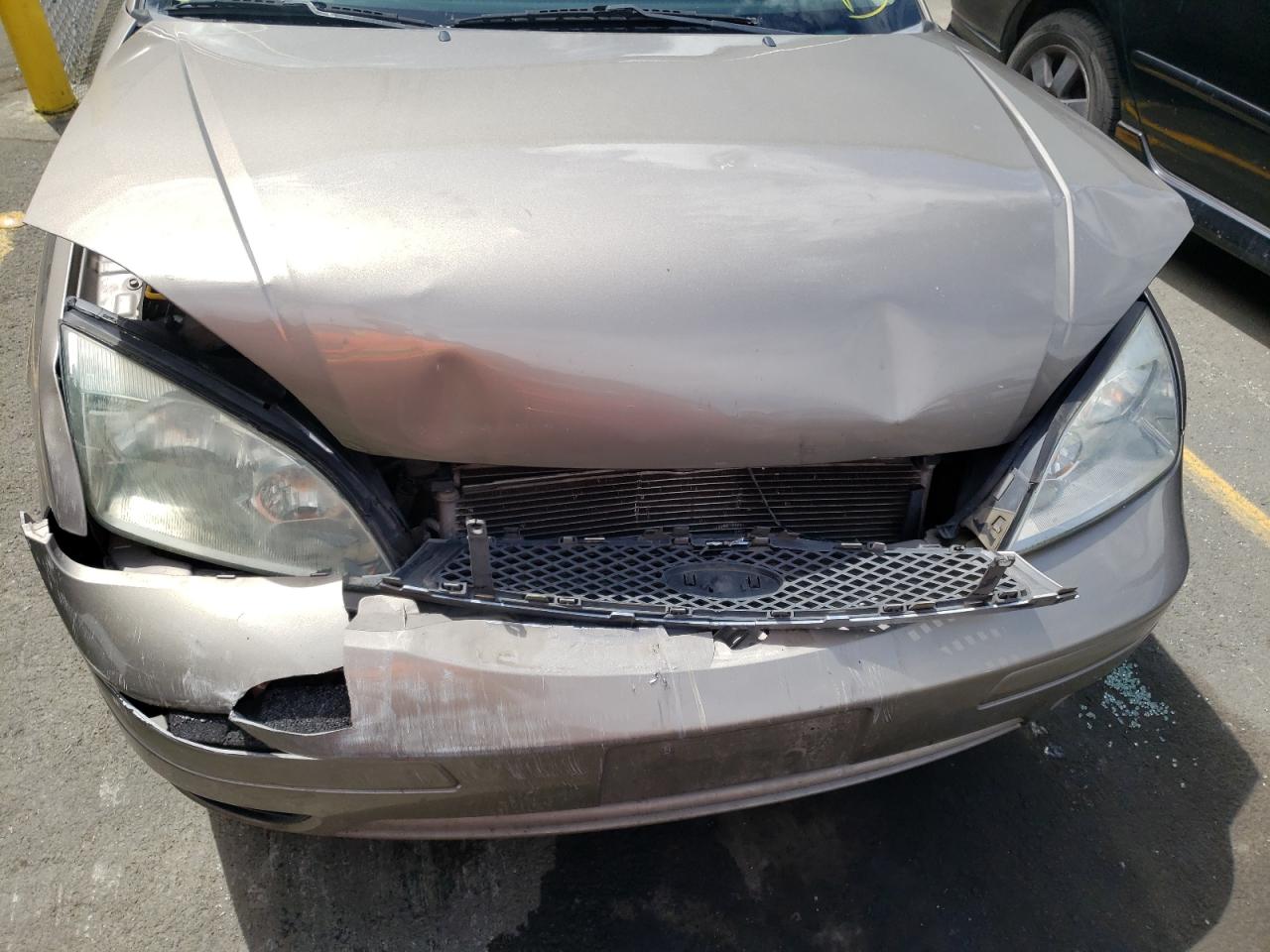 Photo 9 from auction – 2005 FORD FOCUS ZX4 with VIN 1FAFP34N25W209795