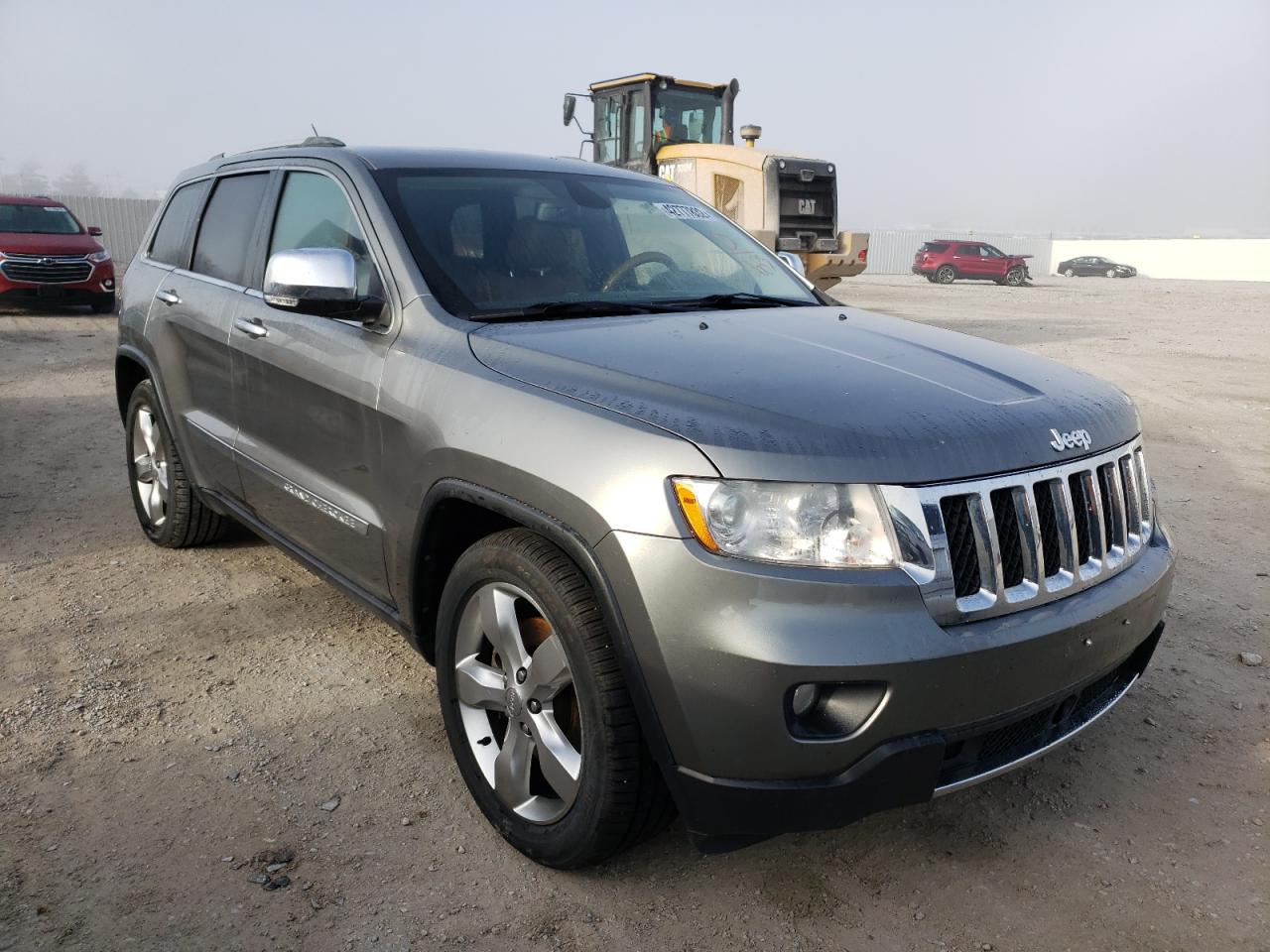JEEP GRAND CHER 2011 with VIN 1J4RR6GT4BC660683 - Photo from auction