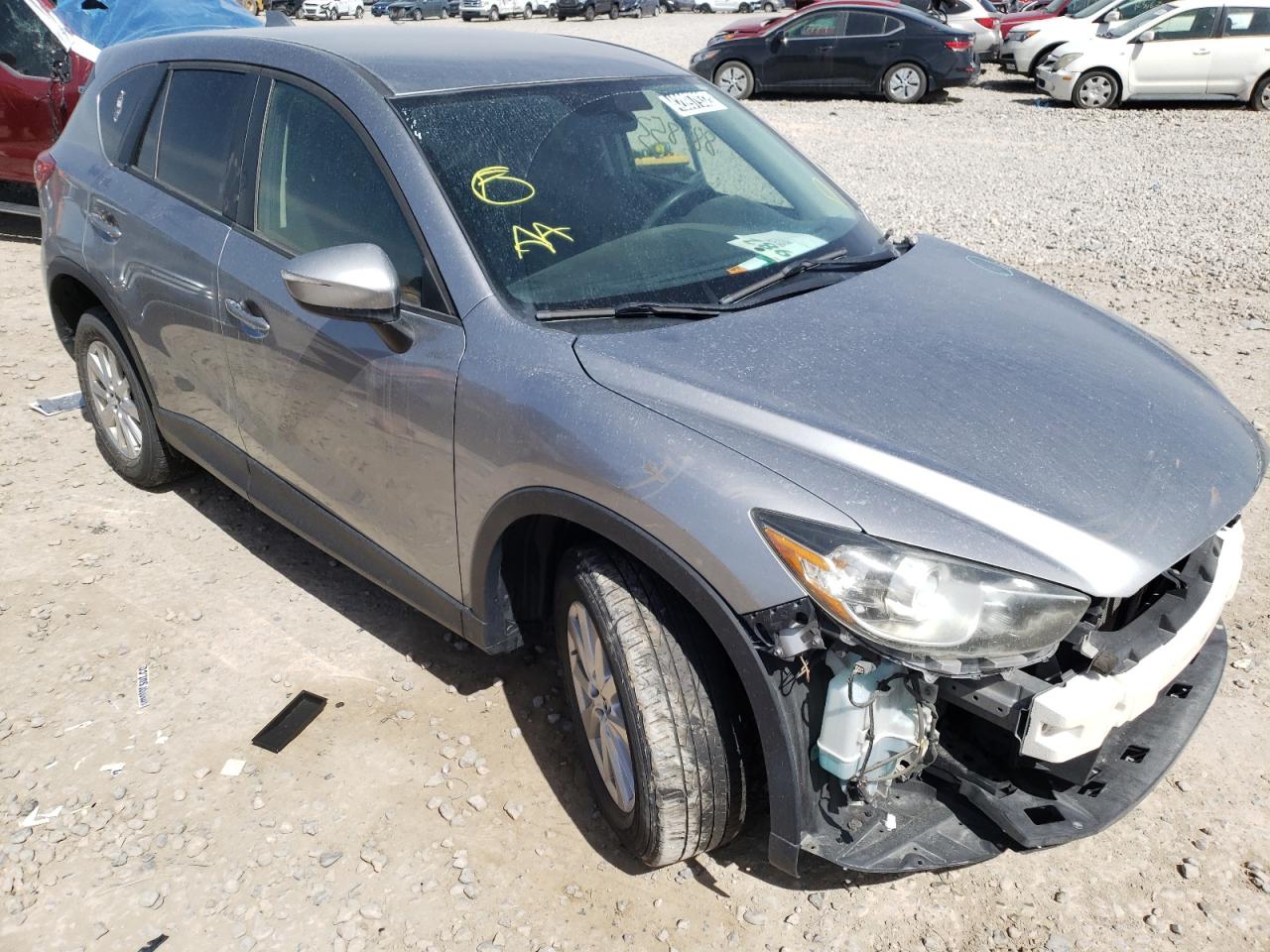 MAZDA CX-5 SPORT 2015 with VIN JM3KE4BY2F0480966 - Photo from auction