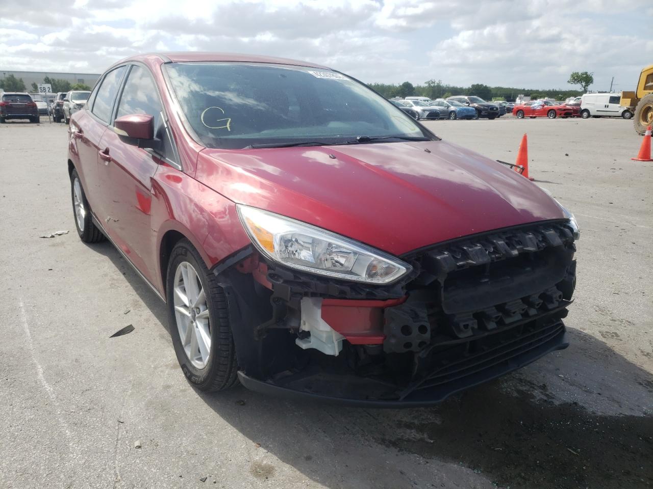 FORD FOCUS SE 2016 with VIN 1FADP3F29GL300741 - Photo from auction