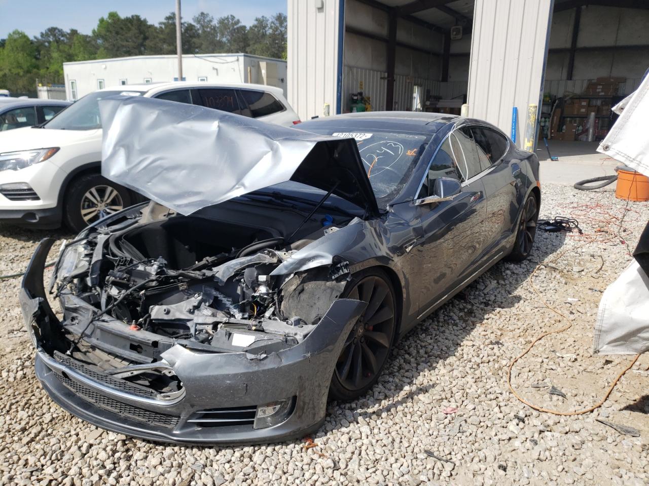 Photo 2 from auction – 2014 TESLA MODEL S with VIN 5YJSA1H14EFP42841